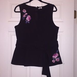 Sleeveless peplum top